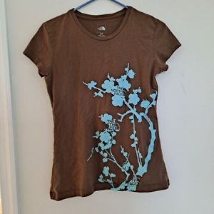 Cute little northface tshirts.  Small.  Brown and turquoise